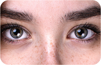 Close-up shot of a woman's eyes gazing at the viewer, showing eye tracking