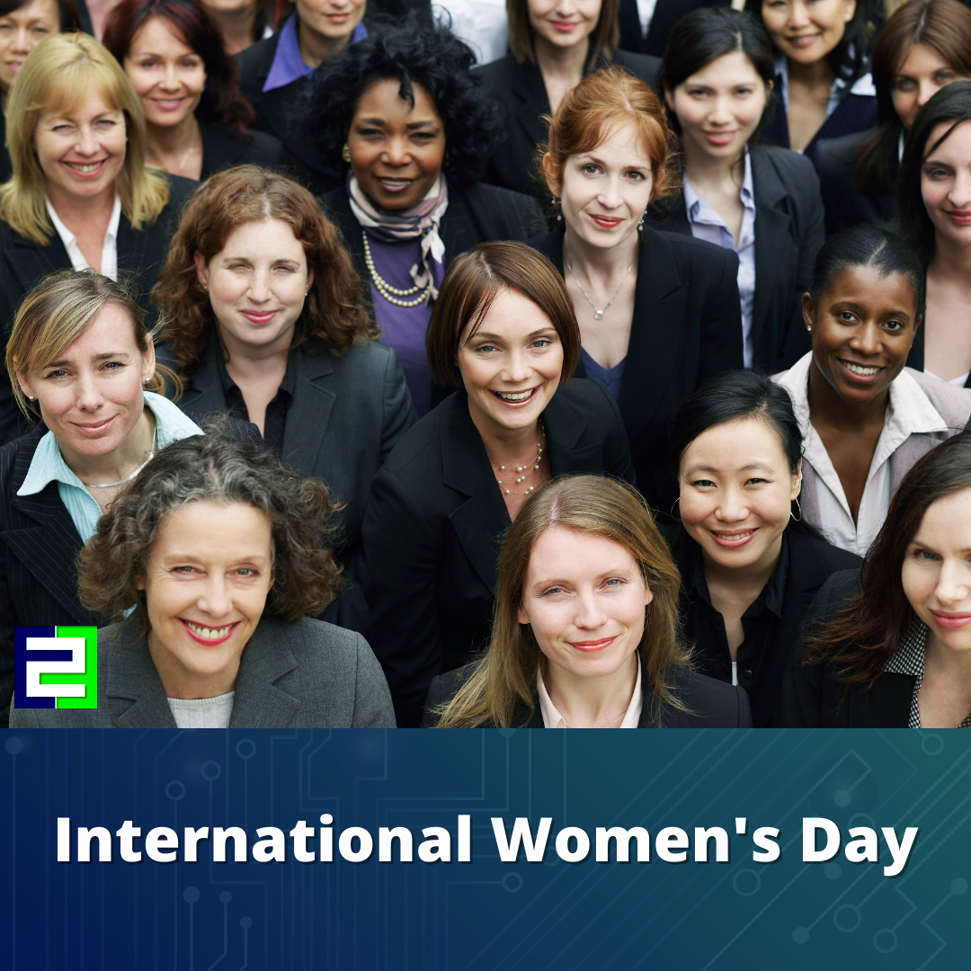 International Women's Day, End To End User Research. A group of professional women smile.